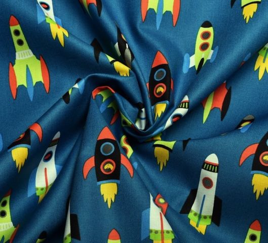 Bavlna kolekce DINO-SOAR modrá s raketami